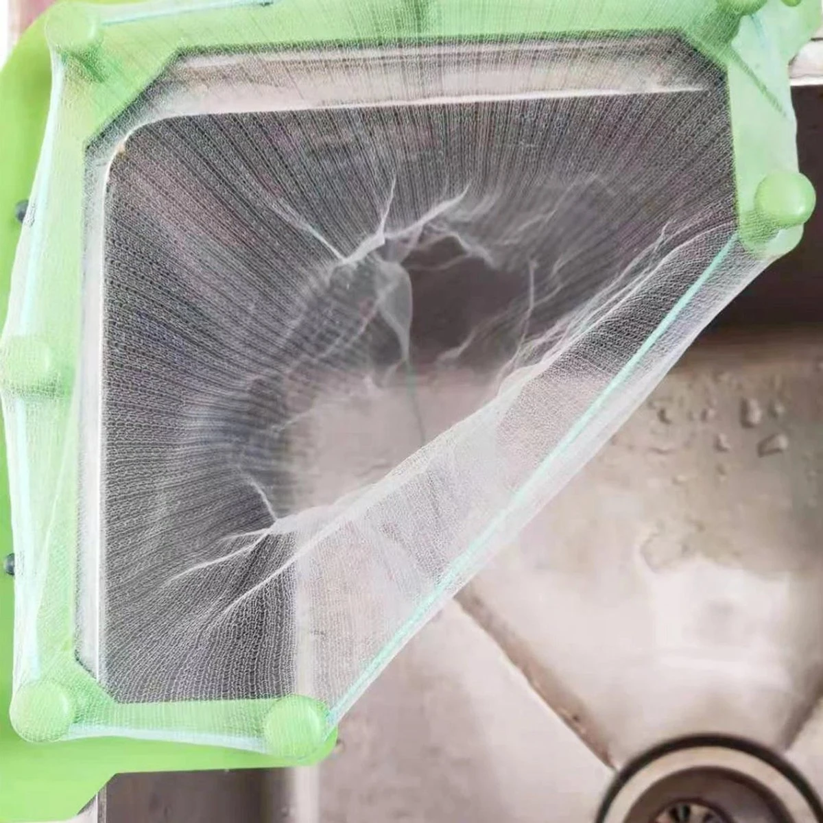 Merkloos Gootsteen Organizer - Gootsteen Afval Netje - Gootsteenontstopper - Spoelbak - Incl. 50 Netjes 4 Merkloos Gootsteen Organizer - Gootsteen Afval Netje - Gootsteenontstopper - Spoelbak - Incl. 50 Netjes - Afbeelding 2